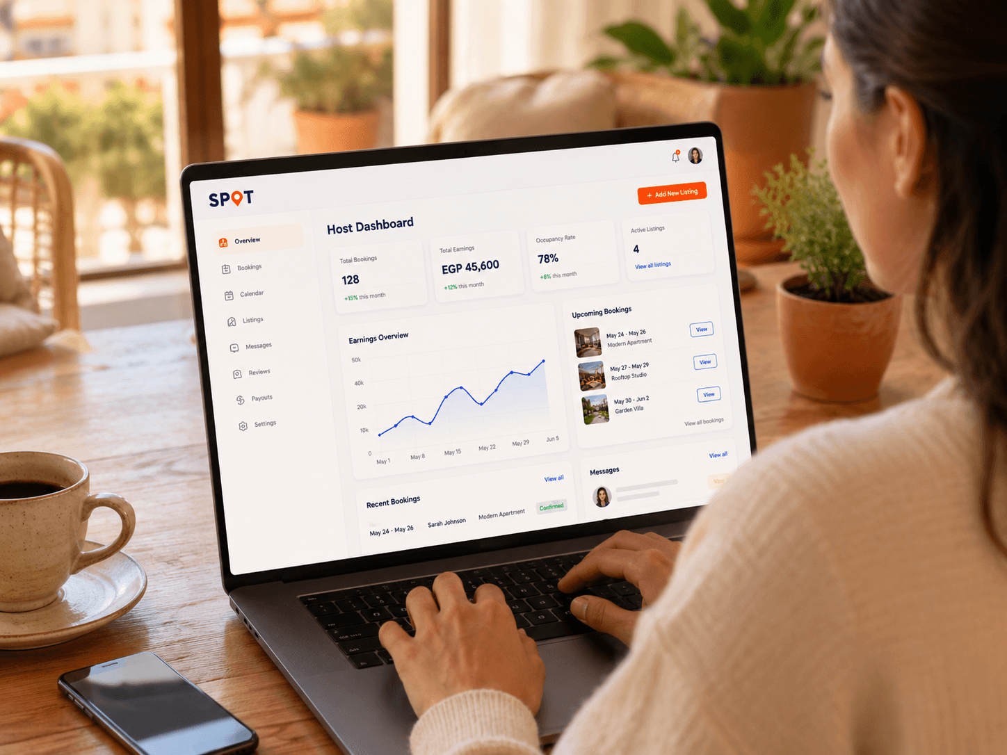 Host managing bookings on a laptop